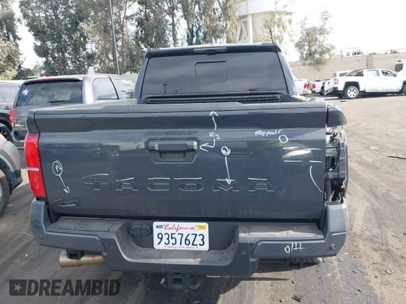2024 Toyota Tacoma SR5 with VIN 3TMLB5JN5RM051339, listed as a IAAI auction lot 41241754 with 7,181 mi miles and . Bid and sale history available at DreamBid. Image 17.