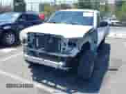 2014 Toyota Tacoma PreRunner z VIN 5TFJX4GN0EX030638, wystawiony jako IAAI lot #43008674 z przebiegiem 94 142 mil mil oraz . Historia ofert i sprzedaży dostępna na DreamBid. Obrazek 6.