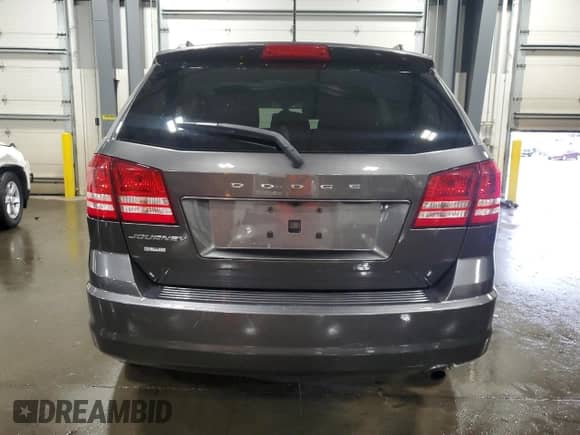 2019 Dodge Journey SE Value with VIN 3C4PDCAB3KT873414, listed as a Copart auction lot 65546175 with 133,095 mi miles and Salvage title. Bid and sale history available at DreamBid. Image 6.