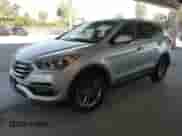 2017 Hyundai Santa Fe 2.4L z VIN 5XYZT3LB1HG496347, wystawiony jako IAAI lot #43306805 z przebiegiem 126 233 mil mil oraz . Historia ofert i sprzedaży dostępna na DreamBid. Obrazek 2.