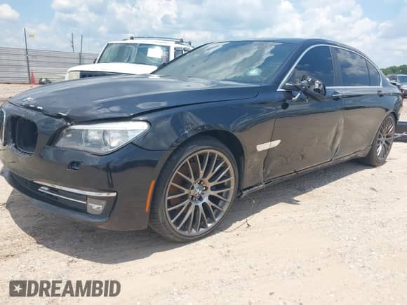 2013 BMW 7 Series 740Li xDrive with VIN WBAYF4C55DD127936, listed as a IAAI auction lot 42559835 with 82,976 mi miles and . Bid and sale history available at DreamBid. Image 18.