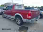 2014 Ram 1500 Laramie with VIN 1C6RR6NT0ES314947, listed as a IAAI auction lot 42934662 with 195,174 mi miles and . Bid and sale history available at DreamBid. Image 3.