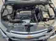 2015 Chevrolet Cruze LT z VIN 1G1PE5SB4F7126172, wystawiony jako Copart lot #71657435 z przebiegiem 117 026 mil mil oraz Szkoda całkowita • Salvage title. Historia ofert i sprzedaży dostępna na DreamBid. Obrazek 11.