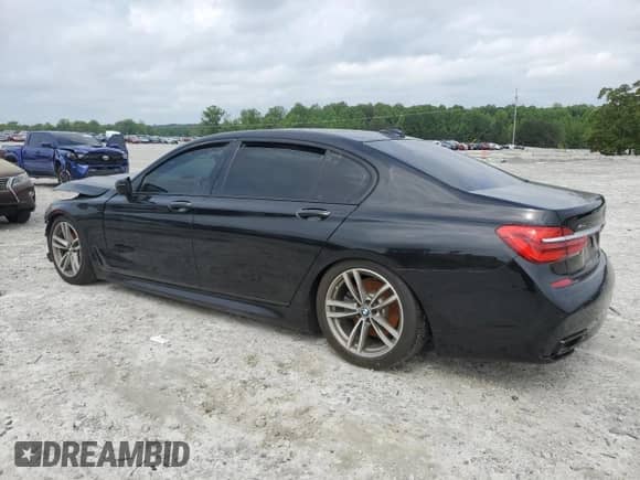 2019 BMW 7 Series 740i xDrive with VIN WBA7E4C51KGV28443, listed as a Copart auction lot 54751395 with Not provided miles and Clean title. Bid and sale history available at DreamBid. Image 2.