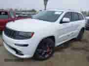 2015 Jeep Grand Cherokee SRT z VIN 1C4RJFDJ5FC190072, wystawiony jako IAAI lot #42980152 z przebiegiem 90 580 mil mil oraz . Historia ofert i sprzedaży dostępna na DreamBid. Obrazek 21.