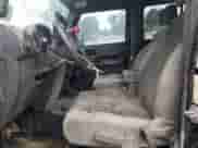 2007 Jeep Wrangler Unlimited Rubicon with VIN 1J4GA69117L112867, listed as a Copart auction lot 59909565 with 166,963 mi miles and Salvage title. Bid and sale history available at DreamBid. Image 7.