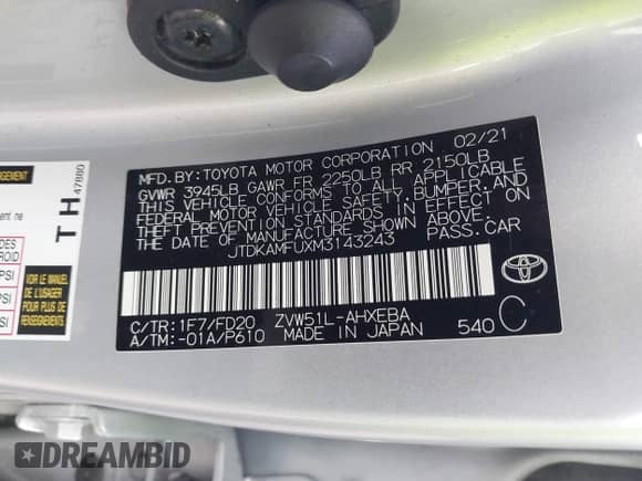 2021 Toyota Prius L Eco with VIN JTDKAMFUXM3143243, listed as a IAAI auction lot 43079577 with 87,002 mi miles and . Bid and sale history available at DreamBid. Image 9.
