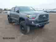 2021 Toyota Tacoma SR with VIN 3TMCZ5AN3MM450562, listed as a IAAI auction lot 43071461 with 15,850 mi miles and . Bid and sale history available at DreamBid. Image 1.