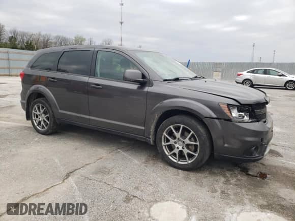 2015 Dodge Journey R/T with VIN 3C4PDDEG9FT749584, listed as a Copart auction lot 66297275 with 150,483 mi miles and Salvage title. Bid and sale history available at DreamBid. Image 4.