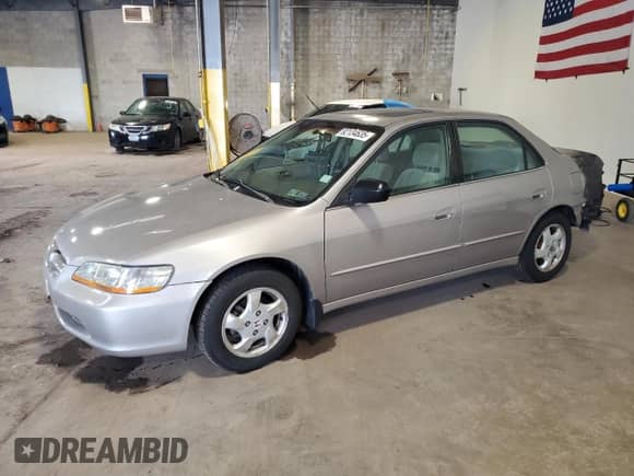 1999 Honda Accord EX with VIN 1HGCG5651XA114815, listed as a Copart auction lot 82134635 with Not provided miles and Salvage title. Bid and sale history available at DreamBid. Image 1.