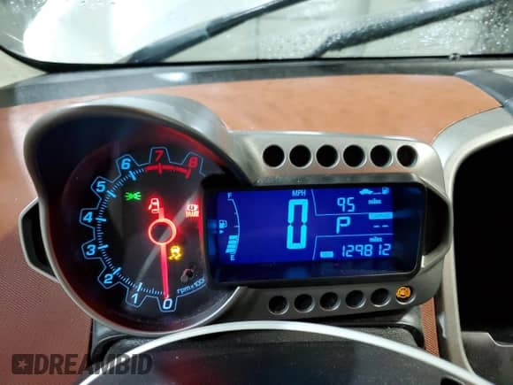 2013 Chevrolet Sonic LTZ with VIN 1G1JE5SH6D4102528, listed as a Copart auction lot 47419475 with 129,812 mi miles and Salvage title. Bid and sale history available at DreamBid. Image 9.