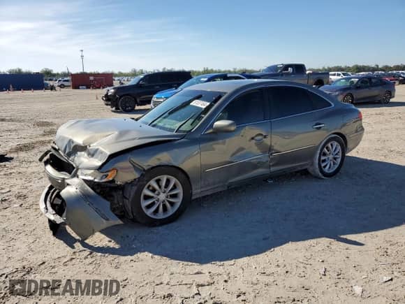 2006 Hyundai Azera SE с VIN KMHFC46F16A133367, выставлен на аукционе Copart как лот 81537464 с пробегом Не указан миль и Списание • Salvage title. История ставок и продаж доступна на DreamBid. Изображение 1.