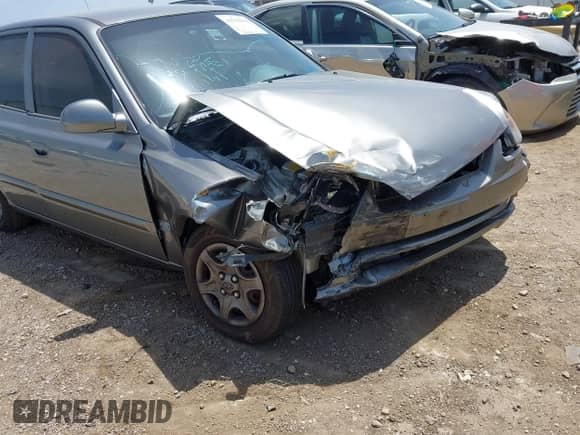 2005 Hyundai Accent GLS z VIN KMHCG45C55U608336, wystawiony jako IAAI lot #42743218 z przebiegiem 221 254 mil mil oraz . Historia ofert i sprzedaży dostępna na DreamBid. Obrazek 6.