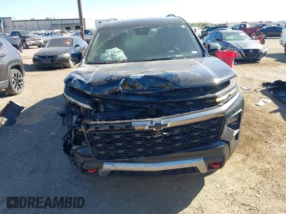 2024 Chevrolet Traverse AWD Z71 z VIN 1GNEVJKSXRJ189699, wystawiony jako IAAI lot #40912796 z przebiegiem 6 423 mil mil oraz . Historia ofert i sprzedaży dostępna na DreamBid. Obrazek 13.