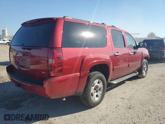 2014 Chevrolet Suburban LT с VIN 1GNSKJE70ER174773, выставлен на аукционе Copart как лот 84274285 с пробегом 203 355 миль миль и Списание • Salvage title. История ставок и продаж доступна на DreamBid. Изображение 3.