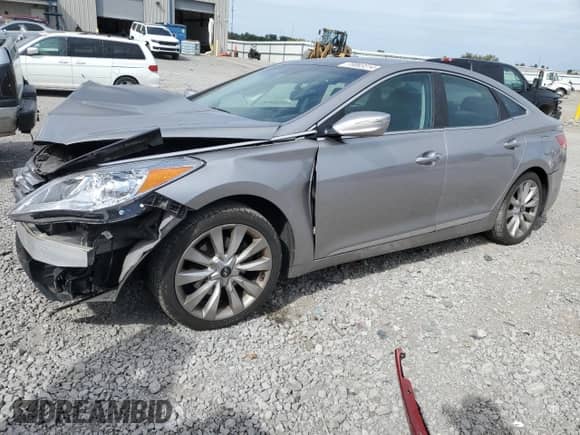 2012 Hyundai Azera с VIN KMHFH4JG3CA002048, выставлен на аукционе Copart как лот 70003314 с пробегом 120 238 миль миль и Списание • Salvage title. История ставок и продаж доступна на DreamBid. Изображение 1.