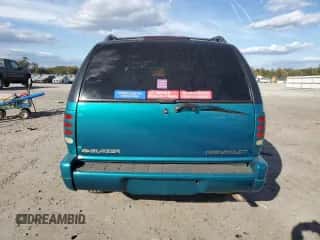 1996 Chevrolet Blazer z VIN 1GNCS13W3T2166106, wystawiony jako Copart lot #73635714 z przebiegiem 162 767 mil mil oraz Czysty tytuł • Clean title. Historia ofert i sprzedaży dostępna na DreamBid. Obrazek 6.