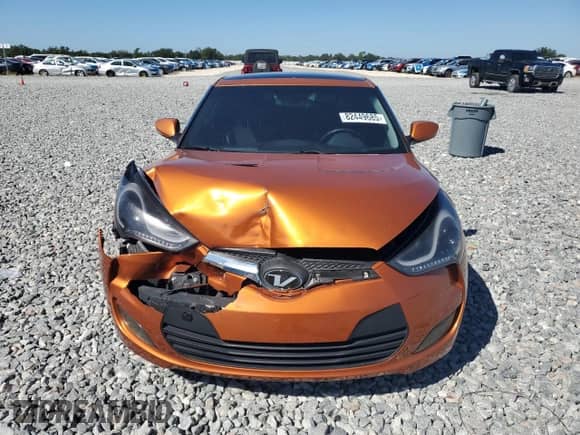 2013 Hyundai Veloster w/Black Int z VIN KMHTC6AD2DU156852, wystawiony jako Copart lot #82449685 z przebiegiem 106 546 mil mil oraz Czysty tytuł • Clean title. Historia ofert i sprzedaży dostępna na DreamBid. Obrazek 5.