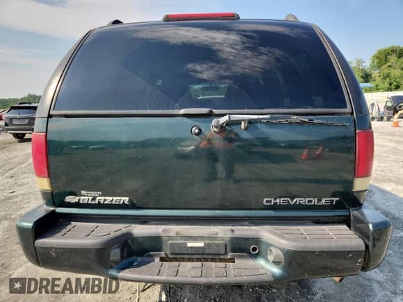 2002 Chevrolet Blazer LS with VIN 1GNDT13W42K208122, listed as a Copart auction lot 69121565 with 111,706 mi miles and Salvage title. Bid and sale history available at DreamBid. Image 6.