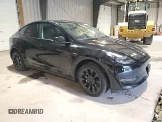 2023 Tesla Model Y Long Range with VIN 7SAYGAEE5PF921301, listed as a Copart auction lot 67586274 with 3,969 mi miles and Salvage title. Bid and sale history available at DreamBid. Image 4.