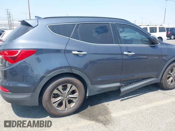 2014 Hyundai Santa Fe with VIN 5XYZU3LB3EG129409, listed as a IAAI auction lot 42987145 with 95,448 mi miles and . Bid and sale history available at DreamBid. Image 6.