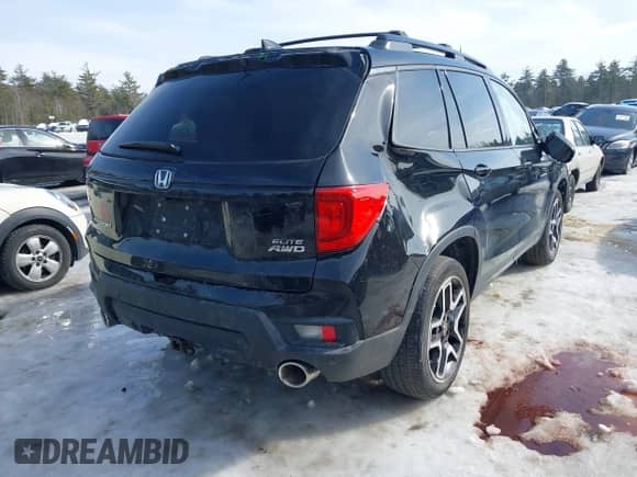 2022 Honda Passport Elite with VIN 5FNYF8H02NB001258, listed as a IAAI auction lot 41631521 with 68,978 mi miles and . Bid and sale history available at DreamBid. Image 4.