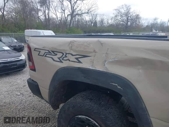 2022 Ram 1500 TRX with VIN 1C6SRFU95NN399791, listed as a IAAI auction lot 42040767 with 38,816 mi miles and . Bid and sale history available at DreamBid. Image 19.