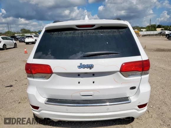 2017 Jeep Grand Cherokee Overland with VIN 1C4RJECG8HC965161, listed as a Copart auction lot 82068045 with 99,654 mi miles and Salvage title. Bid and sale history available at DreamBid. Image 6.