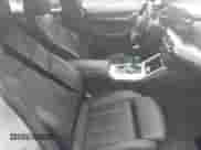 2022 BMW i4 eDrive40 with VIN WBY73AW00NFN14842, listed as a IAAI auction lot 42313404 with 23,556 mi miles and . Bid and sale history available at DreamBid. Image 5.