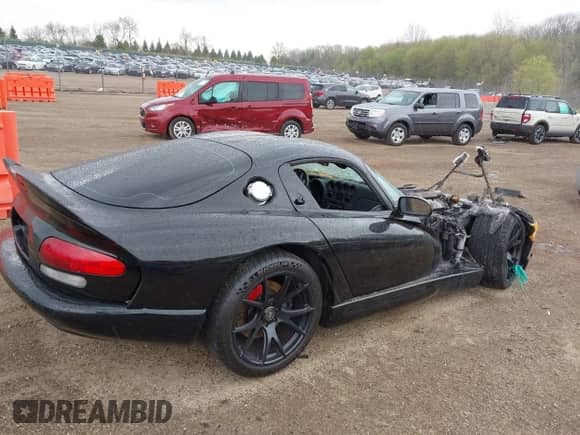 1999 Dodge Viper GTS with VIN 1B3ER69E0XV502941, listed as a IAAI auction lot 42128115 with Not provided miles and . Bid and sale history available at DreamBid. Image 4.