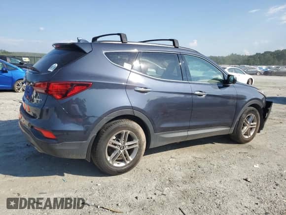 2018 Hyundai Santa Fe 2.4L with VIN 5XYZU3LB8JG517245, listed as a Copart auction lot 68663515 with 101,109 mi miles and Salvage title. Bid and sale history available at DreamBid. Image 3.