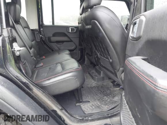 2021 Jeep Wrangler Unlimited Rubicon with VIN 1C4HJXFG8MW759060, listed as a IAAI auction lot 42264273 with 48,393 mi miles and . Bid and sale history available at DreamBid. Image 8.