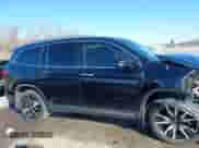 2020 Honda Pilot Touring 7-Passenger z VIN 5FNYF5H64LB006073, wystawiony jako IAAI lot #41750282 z przebiegiem 73 214 mil mil oraz . Historia ofert i sprzedaży dostępna na DreamBid. Obrazek 13.