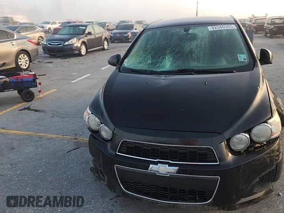 2014 Chevrolet Sonic LT с VIN 1G1JC6SH1E4169616, выставлен на аукционе Copart как лот 82540305 с пробегом 156 769 миль миль и Списание • Salvage title. История ставок и продаж доступна на DreamBid. Изображение 13.