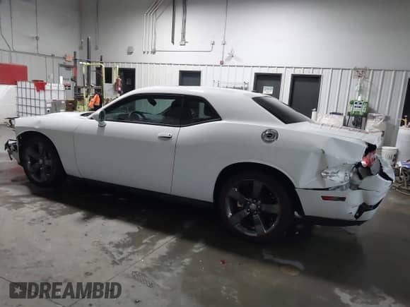 2013 Dodge Challenger SXT with VIN 2C3CDYAG8DH554016, listed as a IAAI auction lot 41275678 with 55,826 mi miles and . Bid and sale history available at DreamBid. Image 14.
