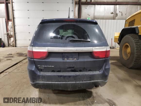 2012 Dodge Durango SXT with VIN 1C4RDJAG2CC267026, listed as a Copart auction lot 71364145 with 129,796 mi miles and Salvage title. Bid and sale history available at DreamBid. Image 6.