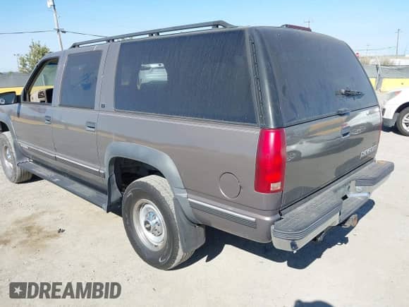 1997 Chevrolet Suburban with VIN 3GNGK26J5VG157926, listed as a IAAI auction lot 43140067 with 143,154 mi miles and . Bid and sale history available at DreamBid. Image 3.