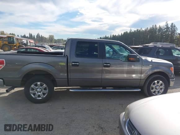 2013 Ford F-150 XL with VIN 1FTFW1CT9DKD08993, listed as a IAAI auction lot 43455467 with 207,161 mi miles and . Bid and sale history available at DreamBid. Image 14.