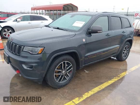 2018 Jeep Grand Cherokee Trailhawk z VIN 1C4RJFLG6JC320763, wystawiony jako IAAI lot #41871683 z przebiegiem 115 417 mil mil oraz . Historia ofert i sprzedaży dostępna na DreamBid. Obrazek 2.