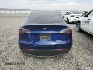 2023 Tesla Model Y Long Range with VIN 7SAYGDEE7PF849910, listed as a Copart auction lot 65620724 with Not provided miles and Salvage title. Bid and sale history available at DreamBid. Image 6.