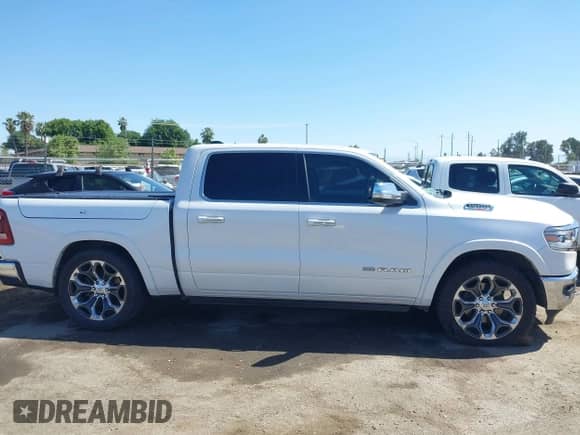 2020 Ram 1500 Longhorn with VIN 1C6SRFKM9LN229373, listed as a IAAI auction lot 42246047 with 134,671 mi miles and . Bid and sale history available at DreamBid. Image 13.