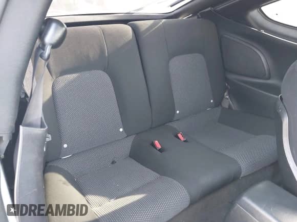 2004 Hyundai Tiburon GS z VIN KMHHM65D64U107599, wystawiony jako IAAI lot #42895093 z przebiegiem 184 234 mil mil oraz . Historia ofert i sprzedaży dostępna na DreamBid. Obrazek 8.