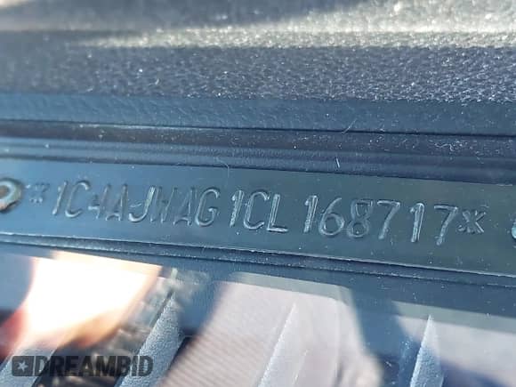 2012 Jeep Wrangler Sport with VIN 1C4AJWAG1CL168717, listed as a IAAI auction lot 43461521 with 106,272 mi miles and . Bid and sale history available at DreamBid. Image 9.