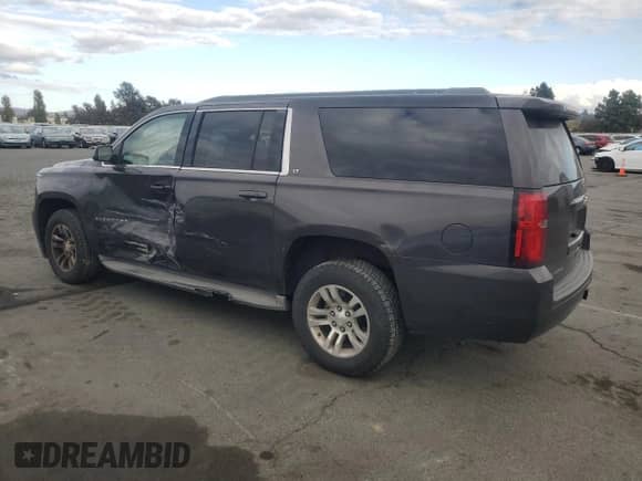 2015 Chevrolet Suburban LT с VIN 1GNSCJKC3FR569739, выставлен на аукционе Copart как лот 82291685 с пробегом 176 880 миль миль и Списание • Salvage title. История ставок и продаж доступна на DreamBid. Изображение 2.