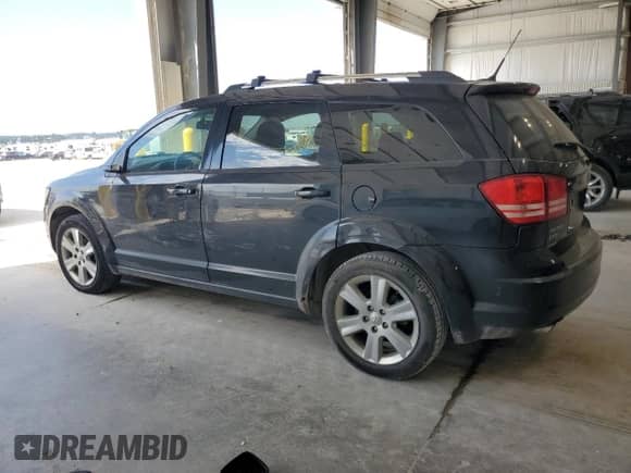 2010 Dodge Journey SXT with VIN 3D4PH5FVXAT202858, listed as a Copart auction lot 80252375 with 180,254 mi miles and Salvage title. Bid and sale history available at DreamBid. Image 2.