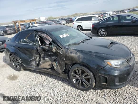 2012 Subaru WRX WRX with VIN JF1GV7E60CG002984, listed as a Copart auction lot 54557175 with 151,891 mi miles and Salvage title. Bid and sale history available at DreamBid. Image 4.