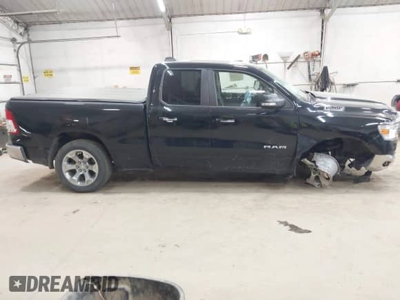 2020 Ram 1500 Big Horn z VIN 1C6SRFBT6LN142263, wystawiony jako IAAI lot #42992728 z przebiegiem 94 208 mil mil oraz . Historia ofert i sprzedaży dostępna na DreamBid. Obrazek 13.