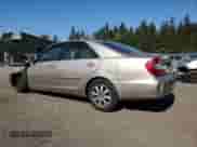 2004 Toyota Camry LE with VIN JTDBF30KX40153887, listed as a Copart auction lot 82175725 with Not provided miles and Salvage title. Bid and sale history available at DreamBid. Image 2.