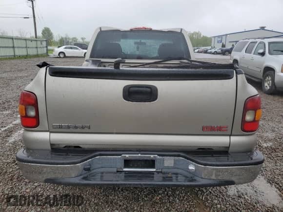 2001 GMC Sierra 1500 SL with VIN 1GTEC14W51Z238201, listed as a Copart auction lot 58315405 with 128,621 mi miles and Salvage title. Bid and sale history available at DreamBid. Image 6.