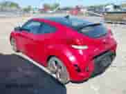 2012 Hyundai Veloster w/Gray Int z VIN KMHTC6AD3CU021409, wystawiony jako IAAI lot #43181633 z przebiegiem 149 988 mil mil oraz . Historia ofert i sprzedaży dostępna na DreamBid. Obrazek 3.